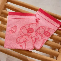 Couché dans les fleurs  2 gants de toilette