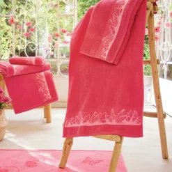 Couché dans les fleurs  2 gants de toilette