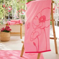 Couché dans les fleurs  2 gants de toilette