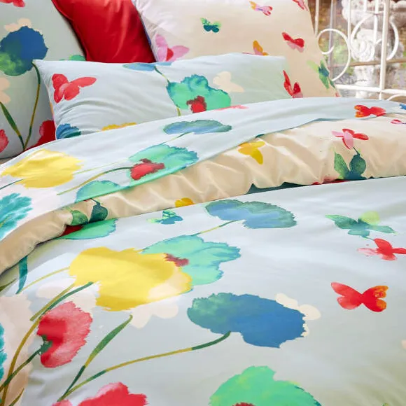 Couché dans les fleurs Housse de couette